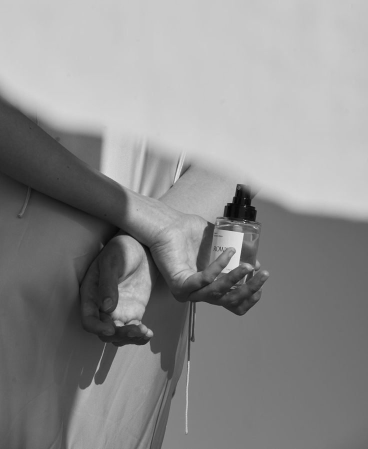 girl holding perfume